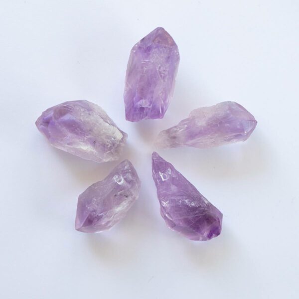 Amethyst Rohstein gebohrt Heilstein