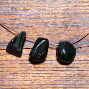 Regenbogen Obsidian Trommelstein gebohrt 20-30mm