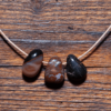 Sardonyx Trommelstein gebohrt 15-20 mm
