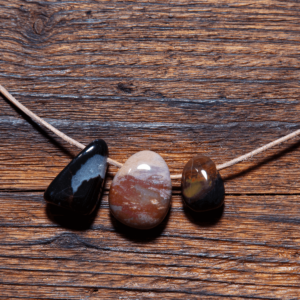 Sardonyx Trommelstein gebohrt 15-20 mm