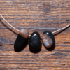 Sardonyx Trommelstein gebohrt 25-30 mm